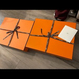 two empty hermes boxes